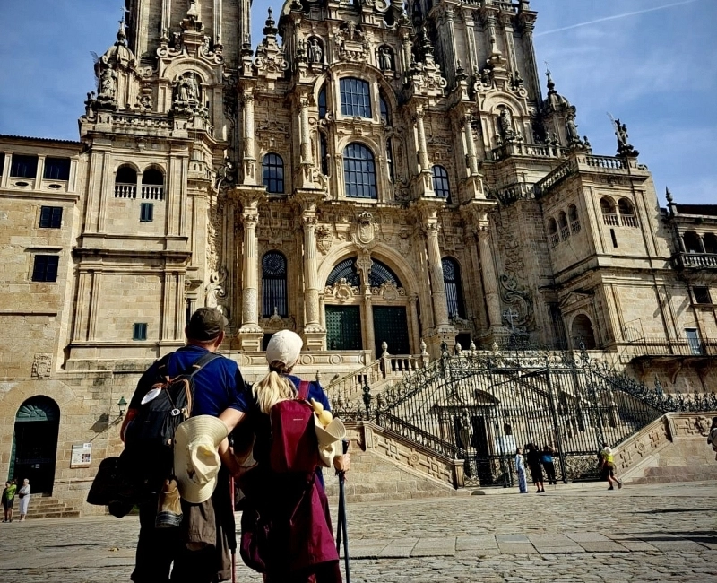 Pilgrim couple in Obradoiro Square